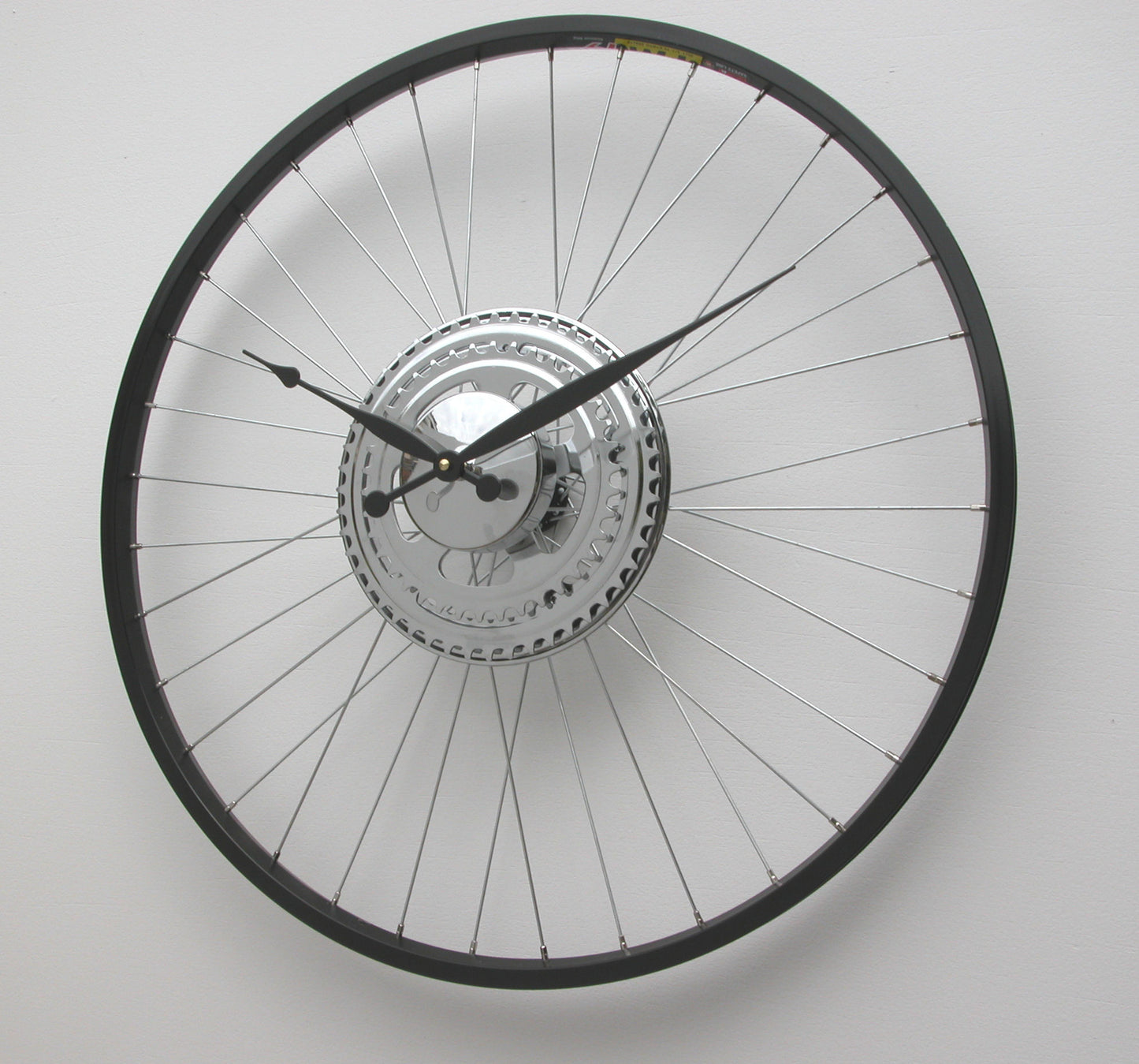 Bike Wheel Clock with black rim and sprocket decoration